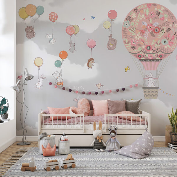 Muurschildering van een vlucht roze ballonnen
