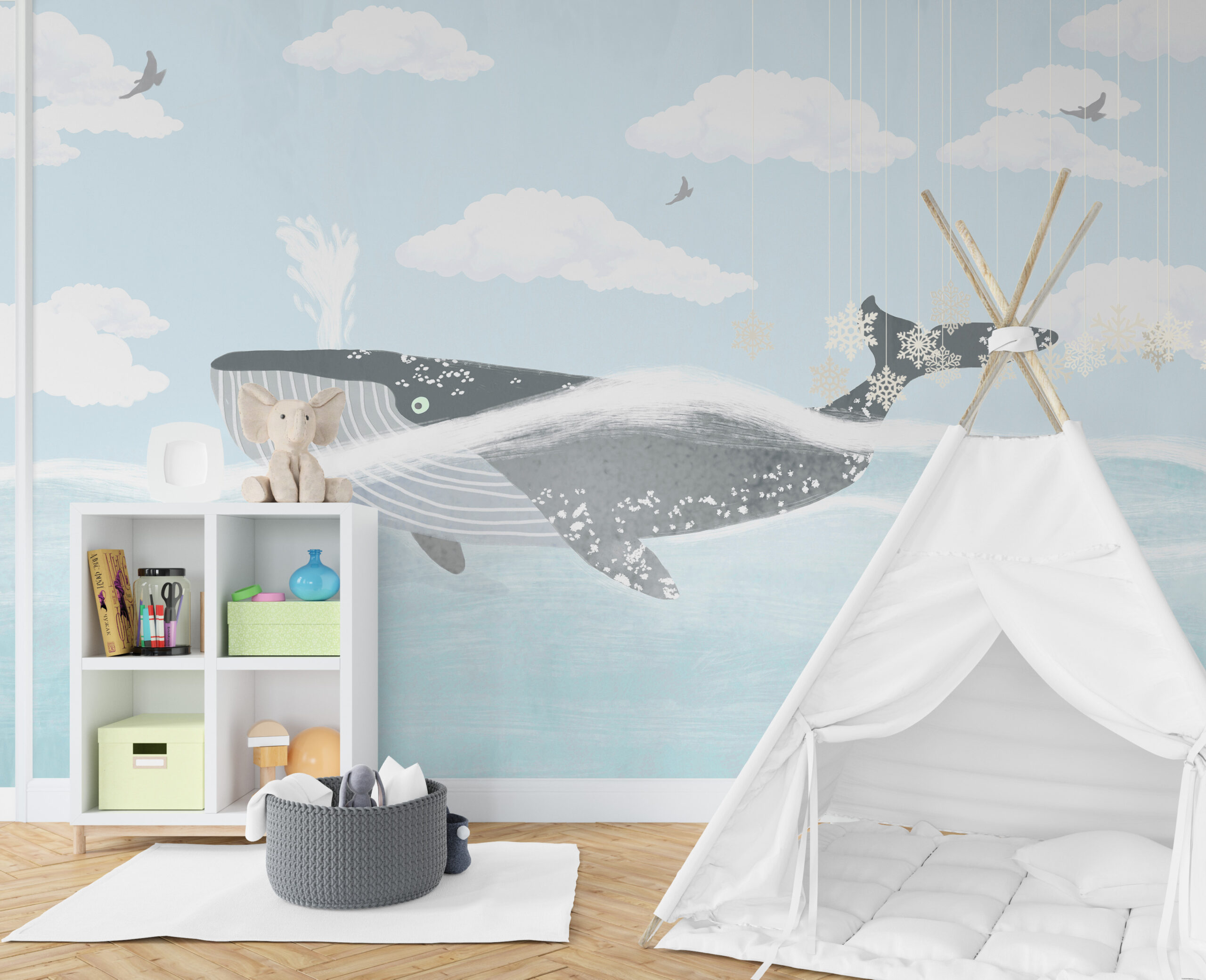 Muurschildering van een walvis in blauw